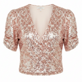 Heartloom pink sequin faux wrap top on white background